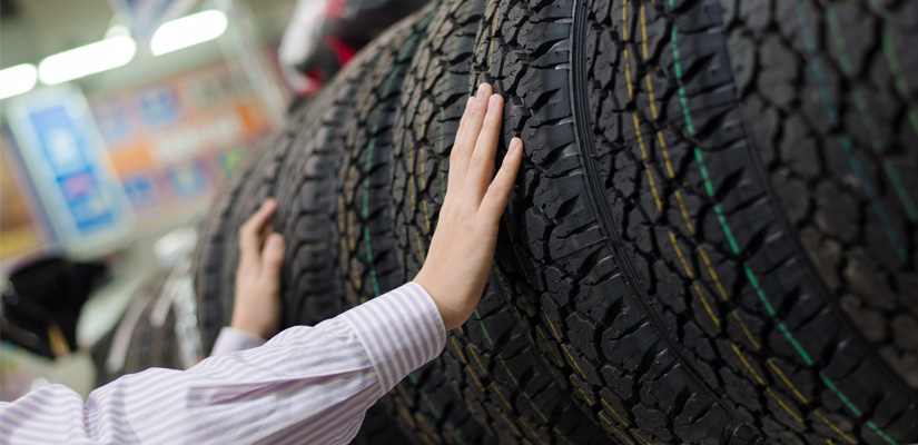 hand on tire